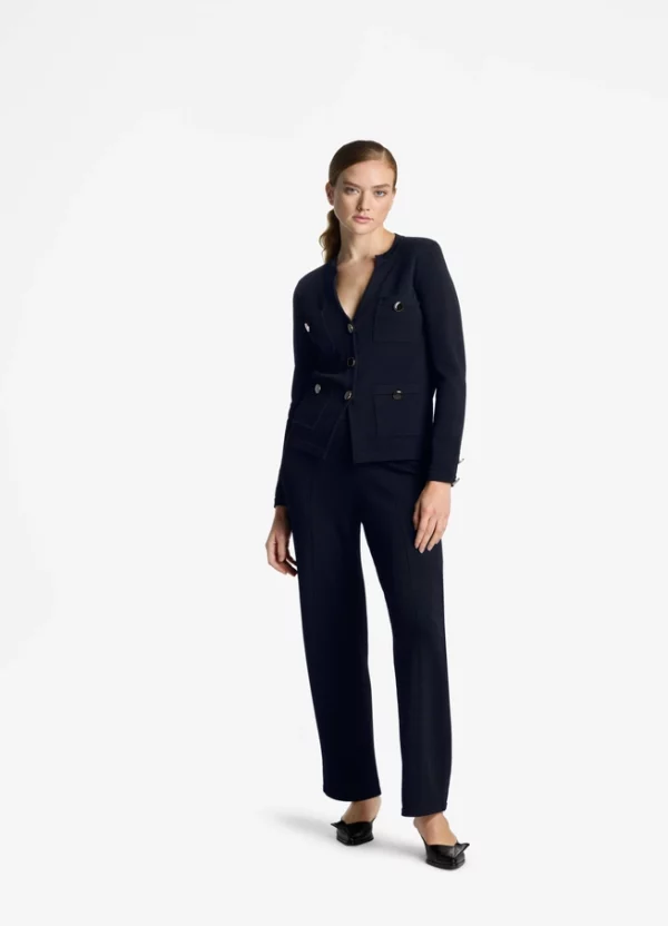 A modern neckline with an open V draws the eye to this chic Santiago Knit button front jacket, a luxurious knit that holds its shape through a lifetime of wear. 68% Viscose, 32% Nylon Overall Length: 24.50 Inches Collar Type: V Neckline Closure Type: Button Sleeve Type: Long Sleeve Sleeve Length: 23.25 Inches Take advantage of our TrueFit sizing if shopping for the first time.